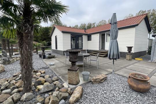Prachtig vakantiehuisje te koop op eigen grond, Zeeland